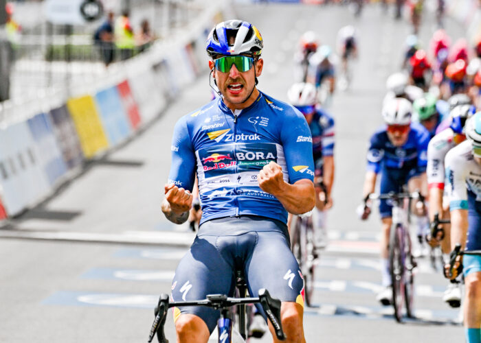 Sam Welsford celebrating the winning of the Tour Down Under 2025 wearing a Ziptrak sponsor kit.