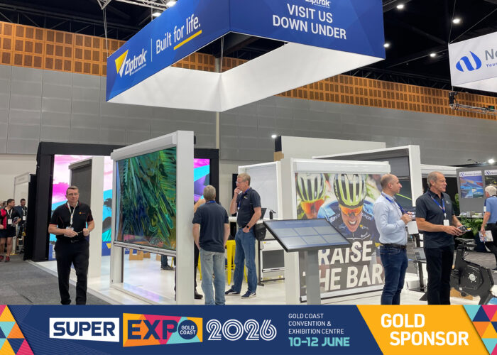 Ziptrak® SuperExpo 2026 stand showcasing outdoor and interior blind displays, digital product demonstrations, staff and visitors at the Gold Coast Convention & Exhibition Centre.