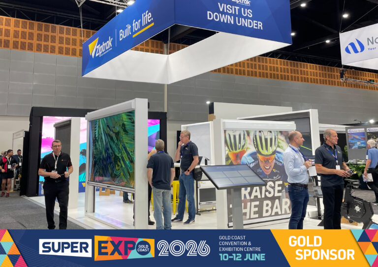 Ziptrak® SuperExpo 2026 stand showcasing outdoor and interior blind displays, digital product demonstrations, staff and visitors at the Gold Coast Convention & Exhibition Centre.