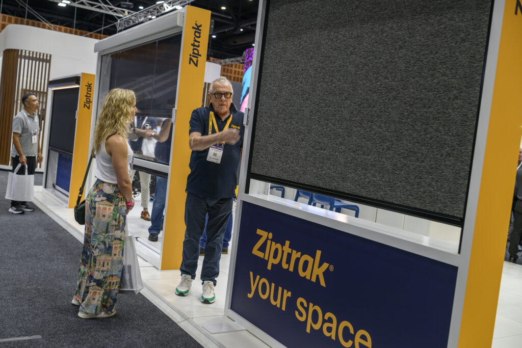 Ziptrak® founder Tony introducing PVC blinds to visitors at SuperExpo 2026